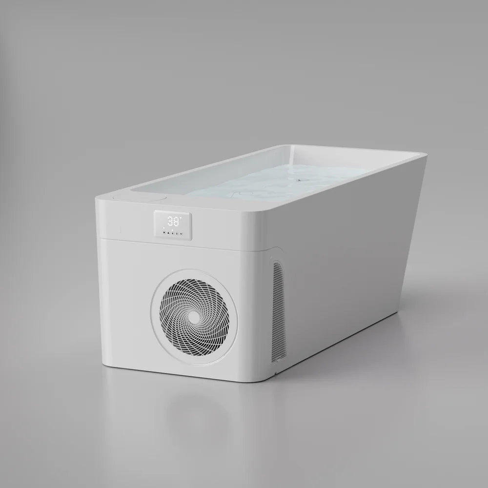 Angled studio view of the white AMBOHR All-in Ice Bath System filled with water and showing 38°F on the display