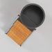Top-down look at the ambohr Armor ArmorSteel CR ice bath tub round opening, covers and planked step deck
