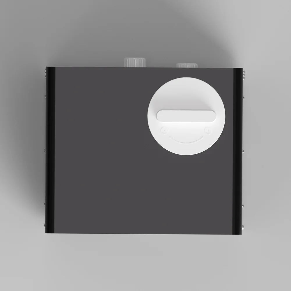Overhead look at the white lever filter cap on the black AMBOHR Mini Chiller Cold Plunge Tub Chiller top panel