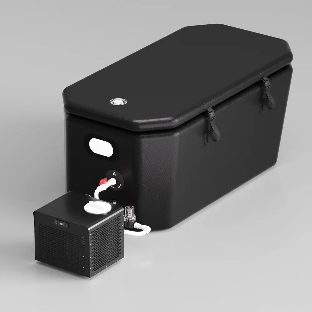 Black inflatable plunge tub hooked up with white hoses to the AMBOHR Mini Chiller Cold Plunge Tub Chiller unit