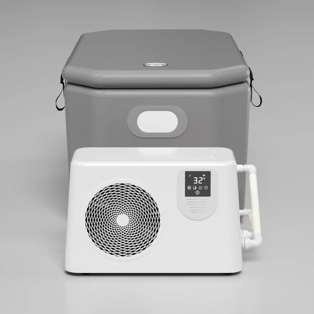 Grey inflatable ice bath connected by PVC piping to the AMBOHR Ultra Chiller Ice Bath Chiller reading 32°F