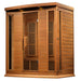 Side-angle view showing cedar plank walls and glass door of the Maxxus Chaumont Red Cedar Sauna cabin
