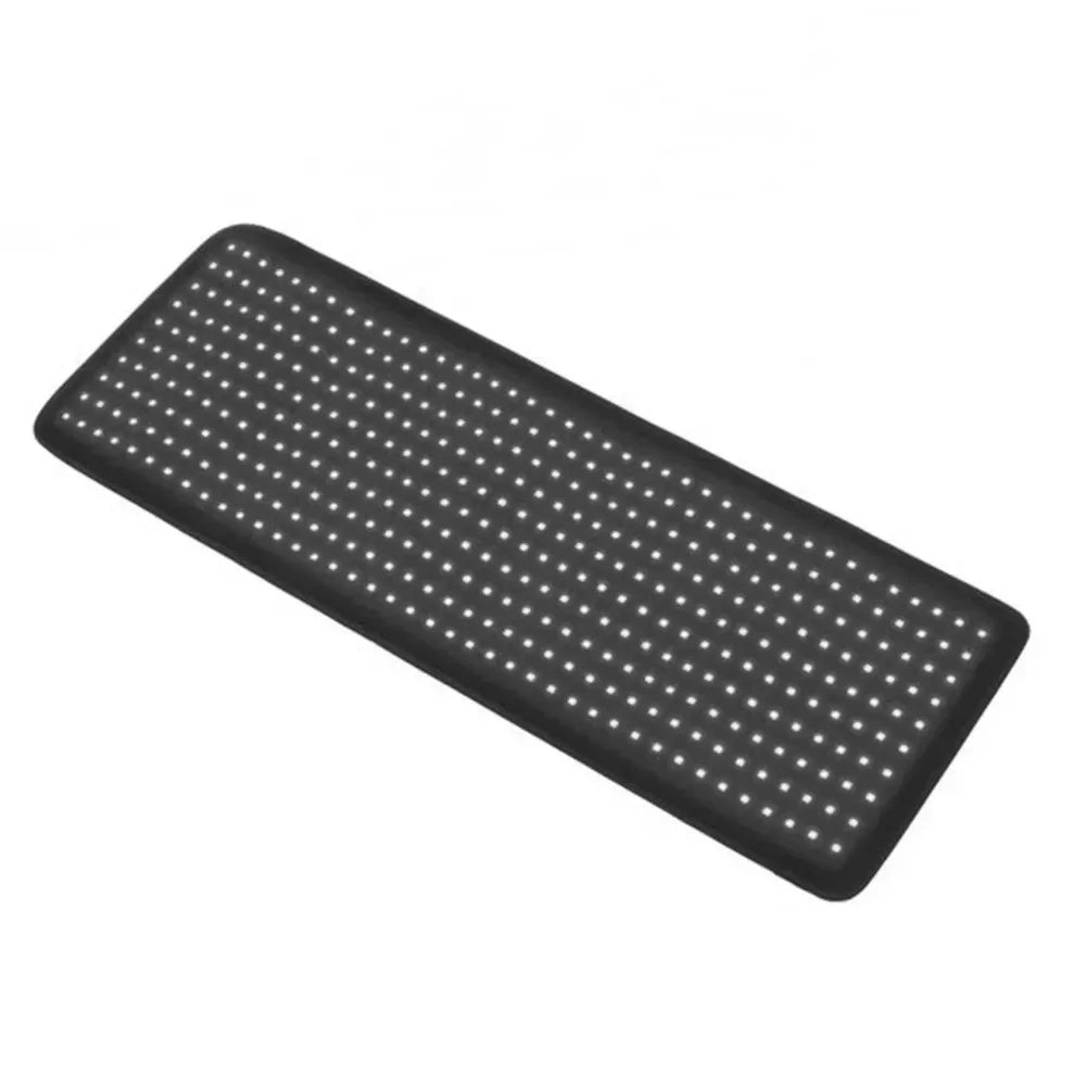 Black LED pad shown at an angle on white, a clean studio look at the Kore KoreKapsule Red Light Therapy Chamber Kit panel
