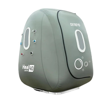 Inflated grey Oxyrevo Heal 40 seen at a three-quarter angle with aluminium base, curved zipper and side valves
