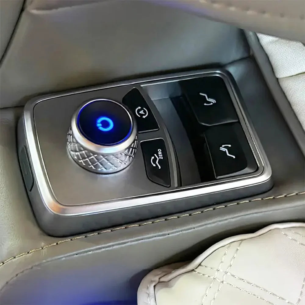 Illuminated smart dial and zero gravity buttons on the armrest of the Infinity Celebrity Elite 4D Chair