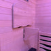 Wooden backrest board above a folding tray bracket inside the Blisspod Helsinki Infrared Sauna cabin