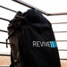 Padded Revive carry bag with straps holding the packed Revive Plunge Inflatable Cold Plunge Pool