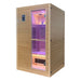 Blisspod Helsinki Infrared Sauna photographed at an angle with the door open and interior lighting on