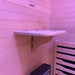Fold-out wooden tray with drink recess beside the bench in the Blisspod Helsinki 2 Person Sauna