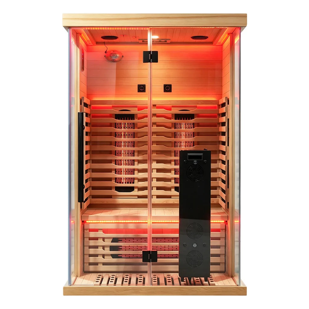 Front studio view of the Blisspod Vantaa RED Home Sauna with warm interior glow behind closed glass doors