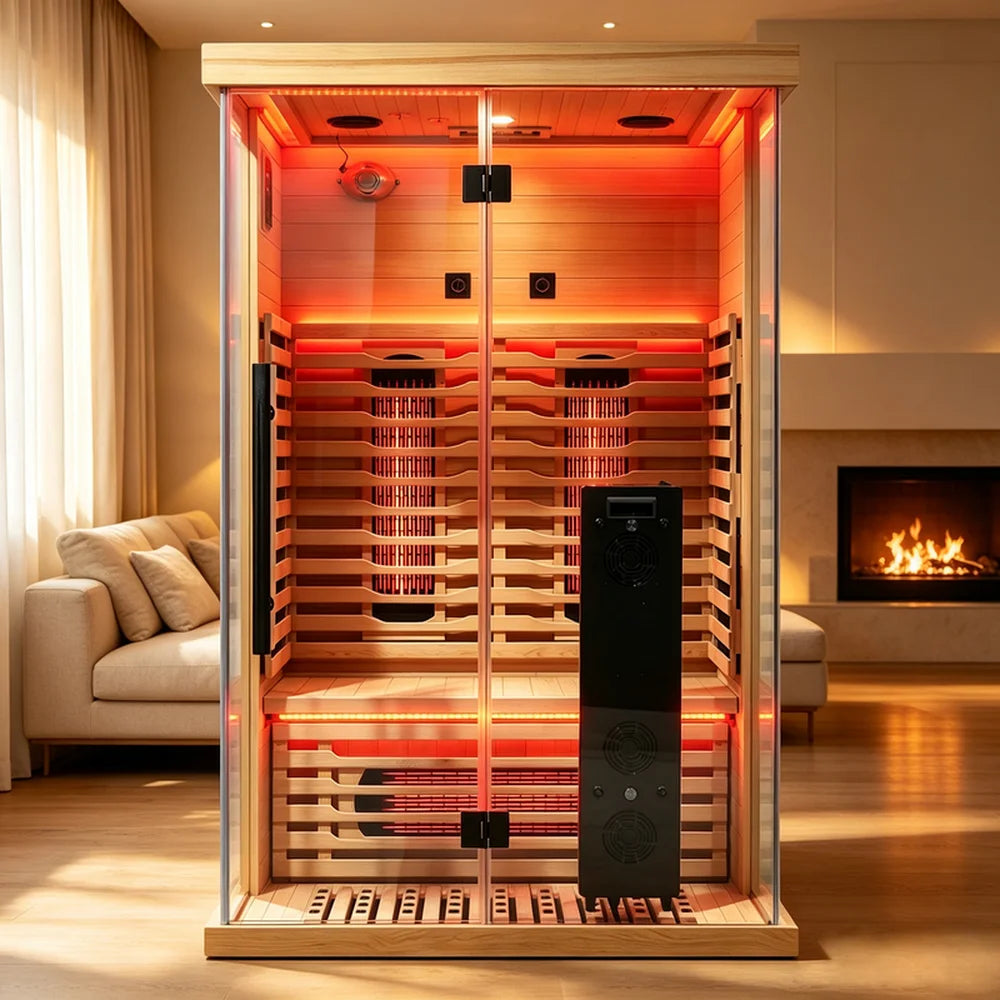 Blisspod Vantaa RED Deluxe Sauna set up in a living room beside a fireplace with heaters glowing behind glass doors