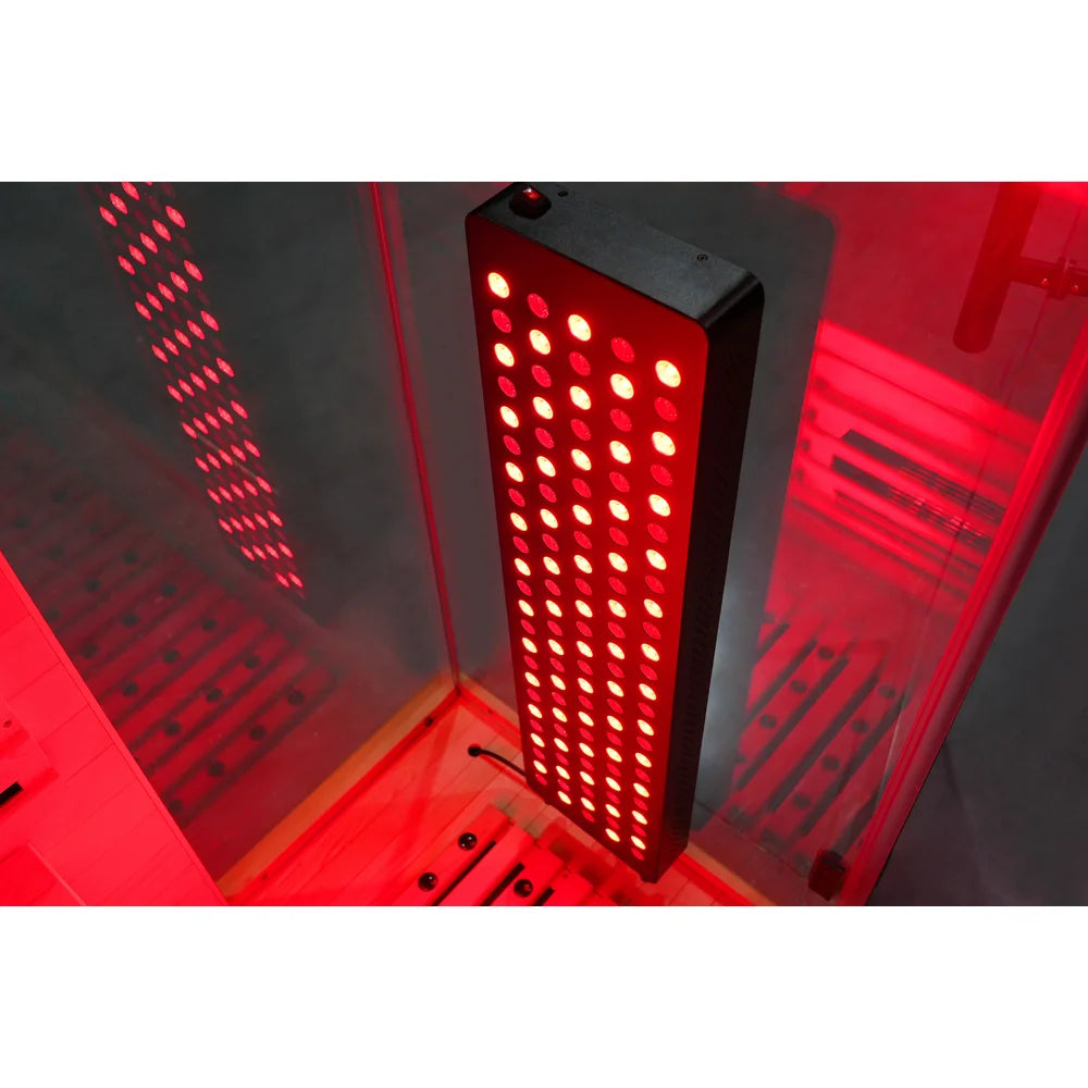 Illuminated LED array of the Blisspod Vantaa RED Red Light Therapy Sauna panel lighting the darkened cabin