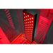 Illuminated LED array of the Blisspod Vantaa RED Red Light Therapy Sauna panel lighting the darkened cabin