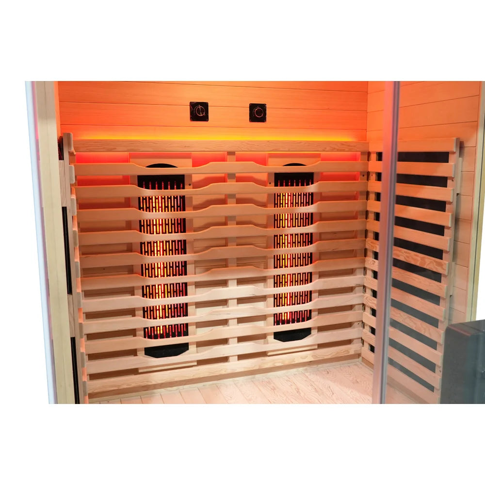 Twin glowing rear heaters and heat intensity knobs inside the Blisspod Vantaa RED Red Light Therapy Sauna