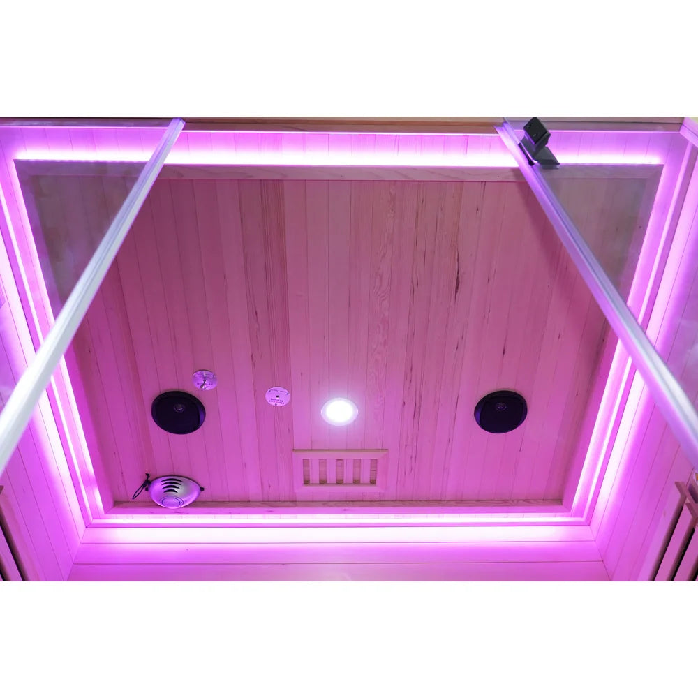 Ceiling speakers, air vent and light inside the Blisspod Vantaa RED Red Light Therapy Sauna in pink light