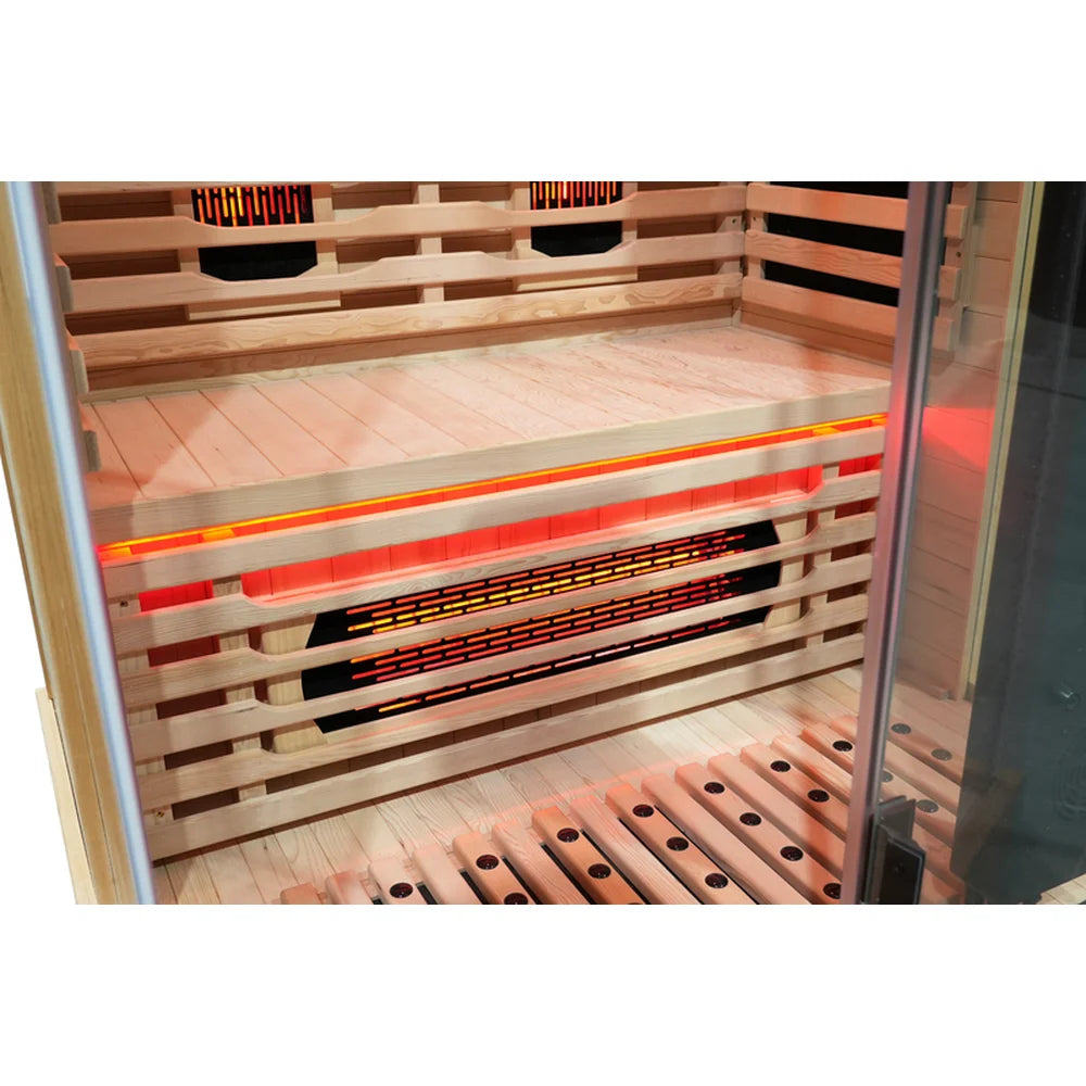 Glowing under-bench full spectrum heater and red accent strip inside the Blisspod Vantaa RED 2 Person Sauna