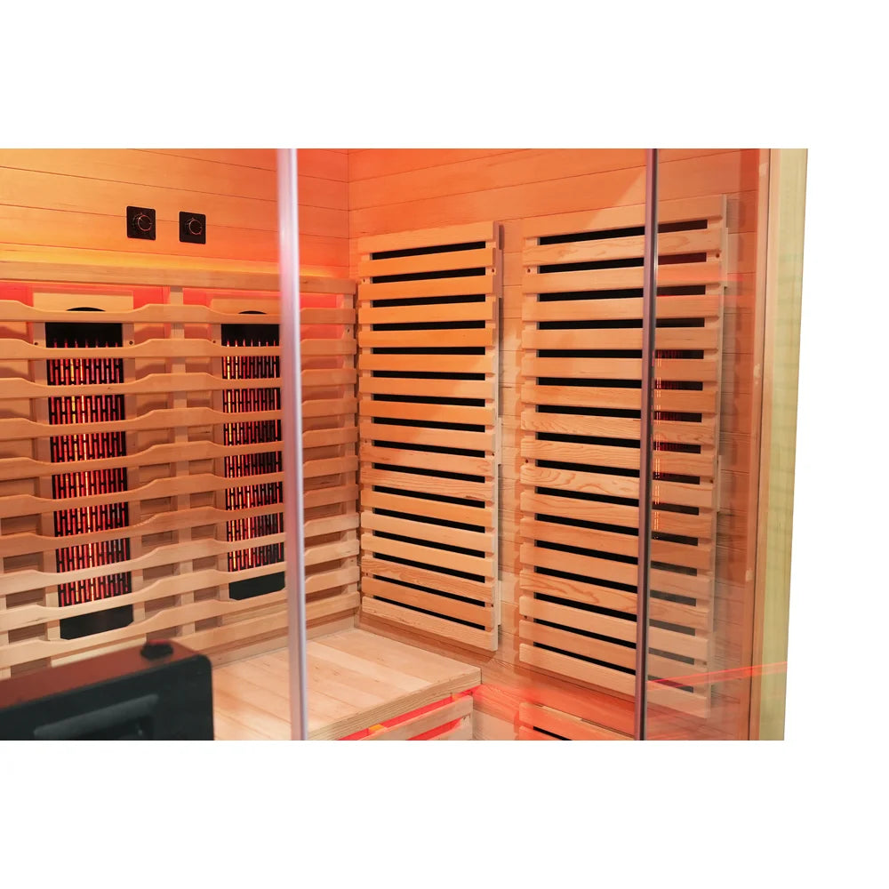 Corner of the Blisspod Venetian RED Deluxe Sauna with glowing back heaters, carbon side panels and control dials