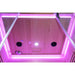 Ceiling LEDs glowing pink around the speakers and vent of the Blisspod Venetian RED Red Light Therapy Sauna