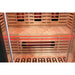 Wooden bench with glowing under-bench heater and red LED strip inside the Blisspod Venetian RED Sauna