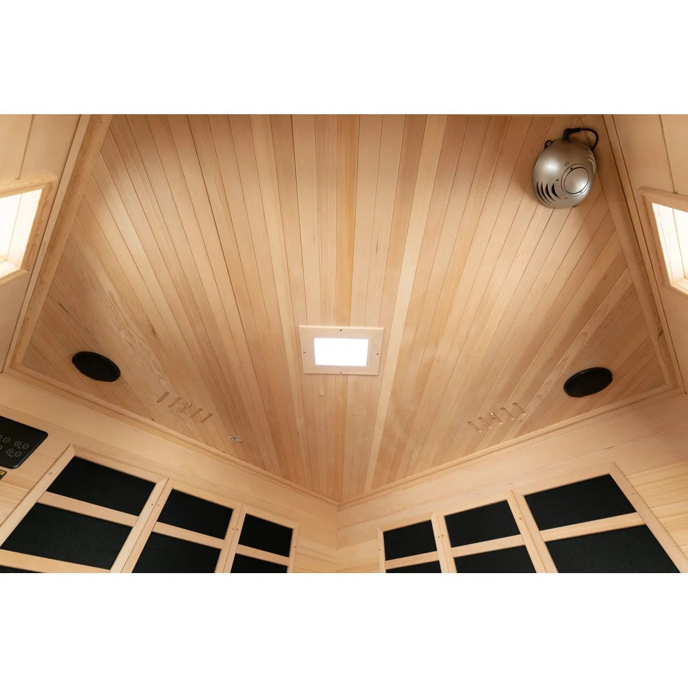 Hemlock ceiling of the Blisspod Vienna Sauna with recessed LED light, ionizer unit, speakers and towel hooks