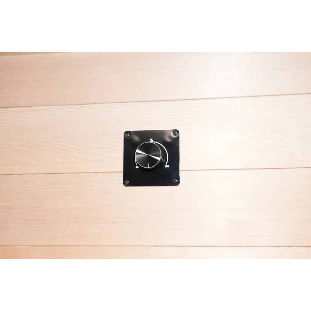 Rotary heat intensity knob marked 20 to 100 on the hemlock wall of the Deluxe Sauna Vienna RED cabin