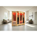 Blisspod Vienna RED Corner Sauna set up in a sunlit living room with sofas, plants and tile flooring
