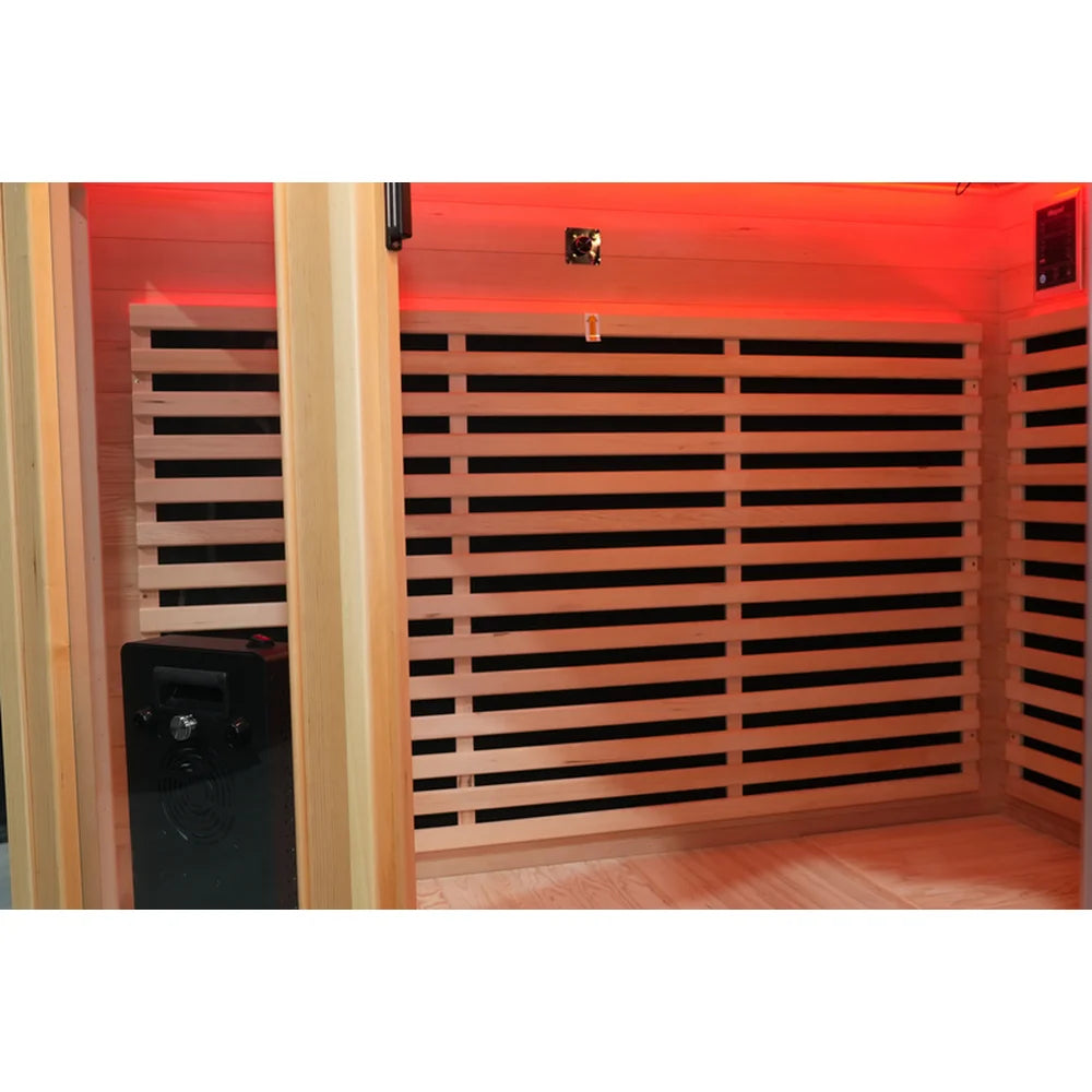 Inside the Blisspod Vienna RED Corner Sauna looking at slatted carbon heater walls under a red LED ceiling strip