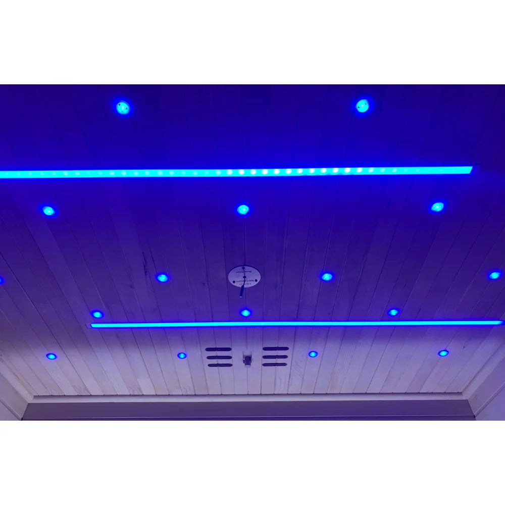 Ceiling LED bars and star points glowing blue from the Blisspod Bergen Full Spectrum Sauna colour light system