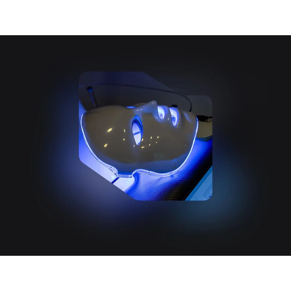 Close-up of the blue LED face mask used after the Vacu Activ Cryo Flow Mini Cold Therapy Device session