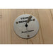 Round temperature sensor plate with probe fixed to the hemlock wall of the Blisspod Bergen Sauna cabin