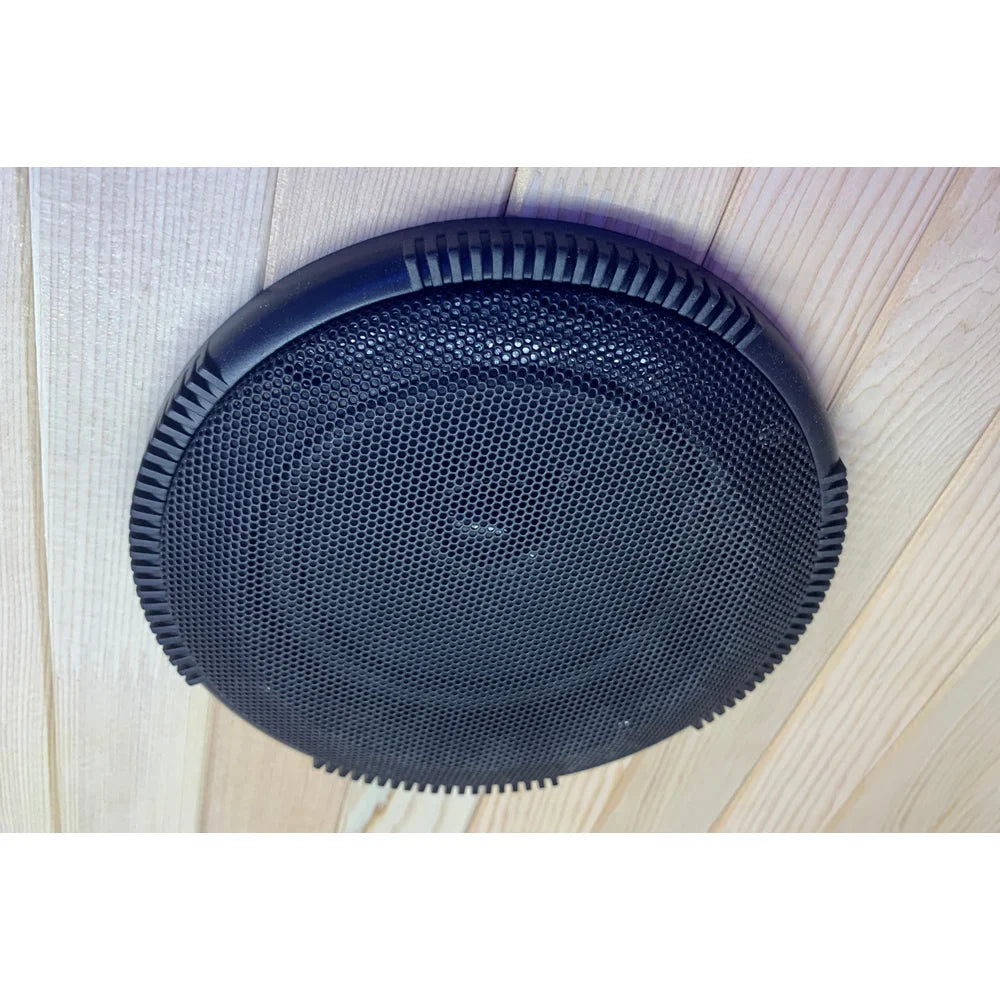 Round black FM and Bluetooth resonance speaker fitted in the Blisspod Helsinki Sauna Pod ceiling