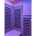 Corner wall carbon heaters behind hemlock slats in the Blisspod Milano Full Spectrum Sauna interior