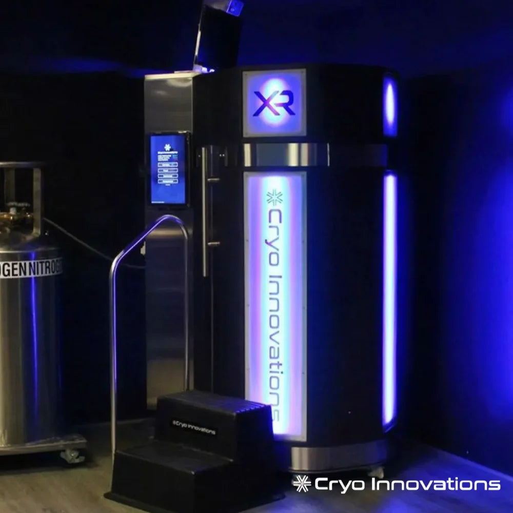 Blue-lit Cryo Innovations XR Cryotherapy Chambers unit with entry steps, side screen and nitrogen tank