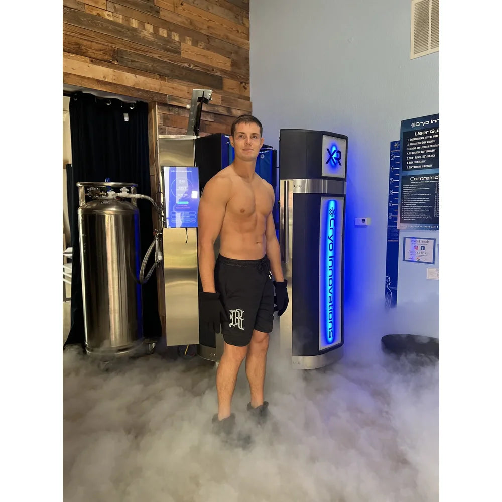 Nitrogen vapor spilling across the floor beside the Cryo Innovations XR Whole Body Cryotherapy Chamber Machine
