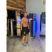 Nitrogen vapor spilling across the floor beside the Cryo Innovations XR Whole Body Cryotherapy Chamber Machine