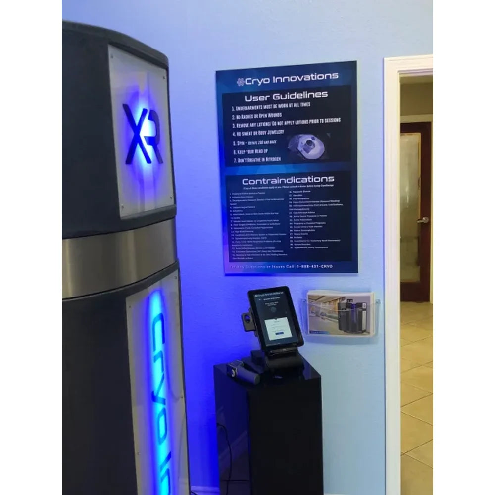 Printed user guidelines and contraindications boards beside Cryo Innovations XR Whole Body Cryotherapy Chambers