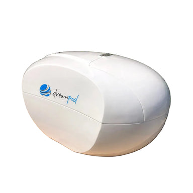 Closed white Dreampod Home Float Plus Sensory Deprivation Tank photographed at an angle on a pallet