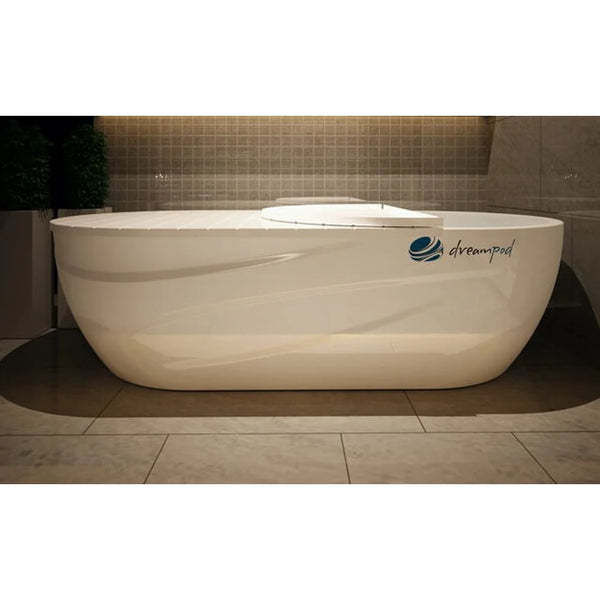 Warmly lit side render of the Dreampod Home Float Pro with the cover closed and brand logo on the glossy white shell