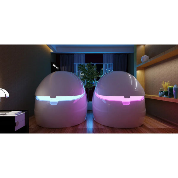 Blue and pink LED entry seam lighting shown on two Dreampod Sport Isolation Tank units in a dark room