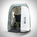 Oxyrevo Heal 40 shown from the front with the door folded open and a wheelchair positioned on the ramp