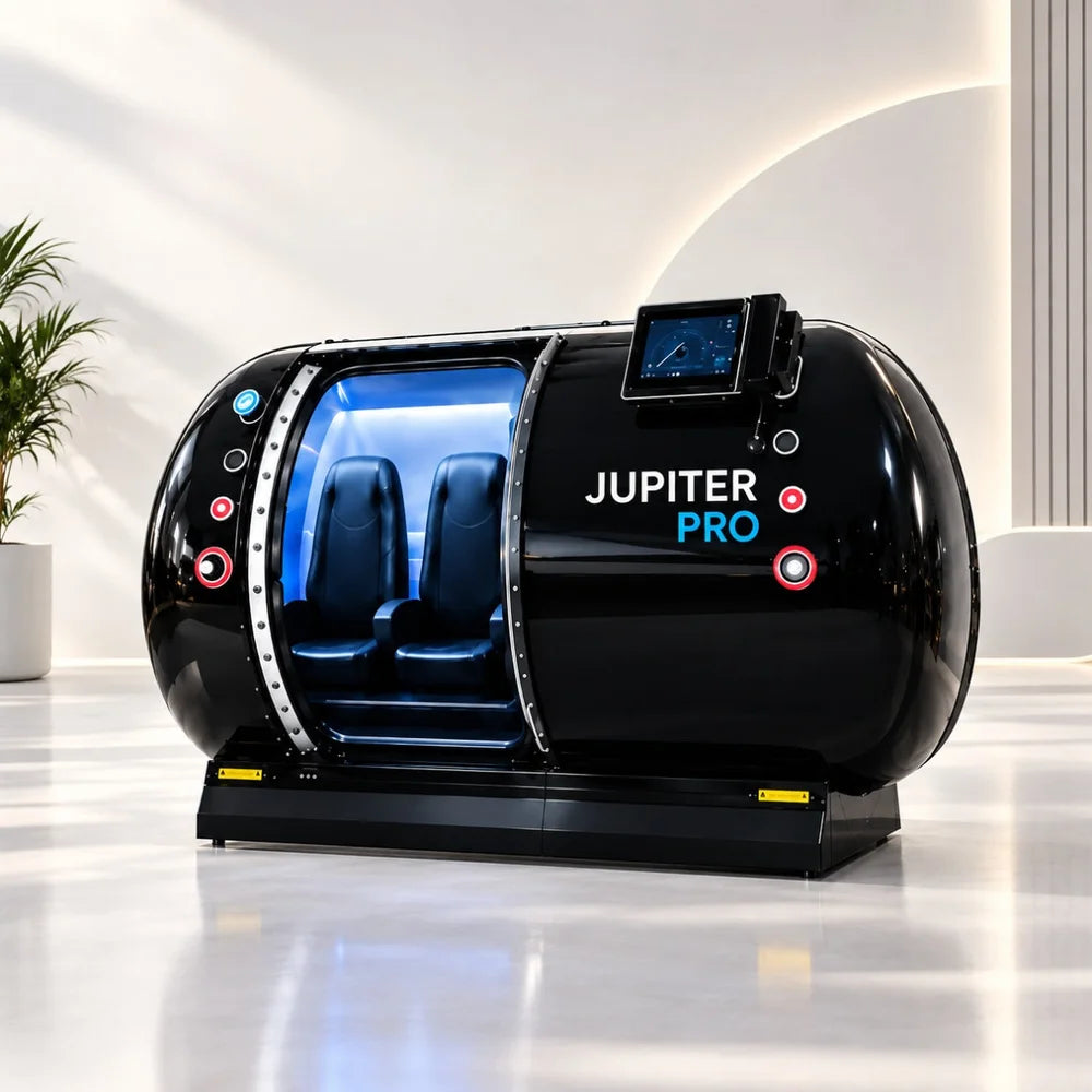 Open door and blue-lit twin seating inside the Galaxy Zero Jupiter Hyperbaric Chamber with top-mounted touchscreen