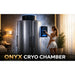 Woman selecting a two-minute session on the wall screen of the Galaxy Zero Onyx Cryotherapy Chamber in a warmly lit spa room