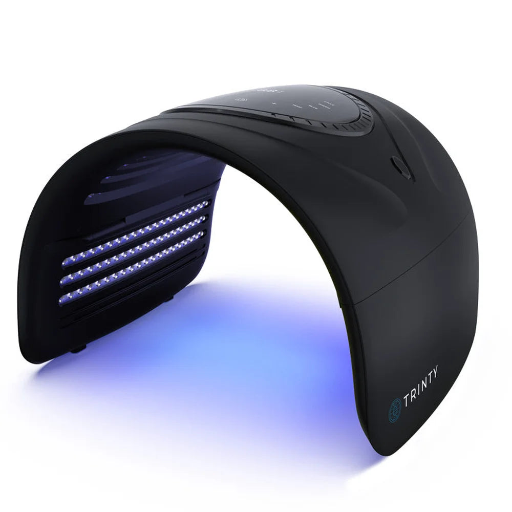 Blue LED rows lit beneath the black arch of the Galaxy Zero USA Trinty LED Device on a white studio background