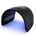 Blue LED rows lit beneath the black arch of the Galaxy Zero USA Trinty LED Device on a white studio background