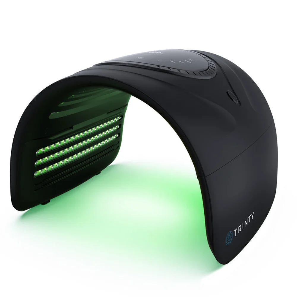 Green LED rows illuminated under the arch of the Galaxy Zero Trinty LED Light Therapy Device on a white background