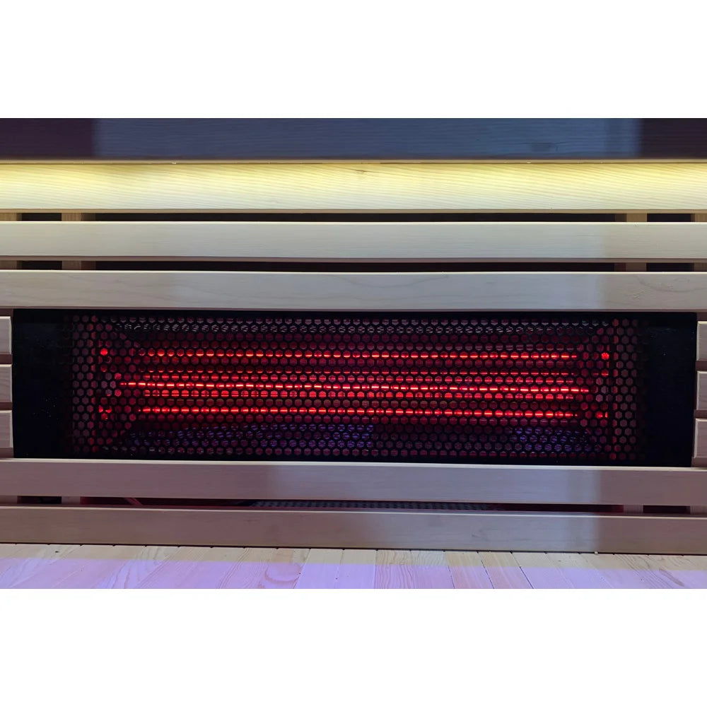 Red glass infrared heater element lit up behind the grille of the Blisspod Helsinki Infrared Sauna