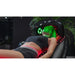 Green LED ring and red headrest diodes treating a resting face on the Vacu Activ Red Couch Oxy Full Body Therapy System
