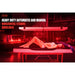 Woman on a table under the horizontally mounted EXESAS 4000W Full Body Red Light Therapy Device on an overhead stand