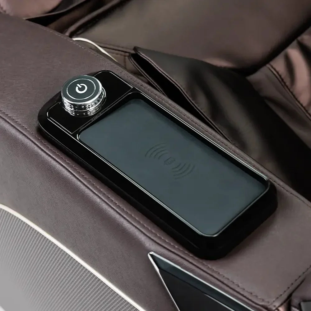 Armrest power dial and wireless charging slot on the Infinity Palisade 4D Max Massage Chair in brown leather