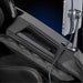 Armrest wireless charging pad and USB-C port on the Infinity Ultra Imperial with a phone on the chrome arm